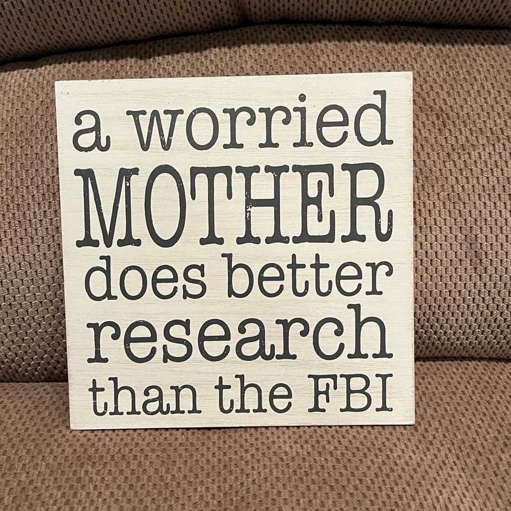 Cute mother daughter sign